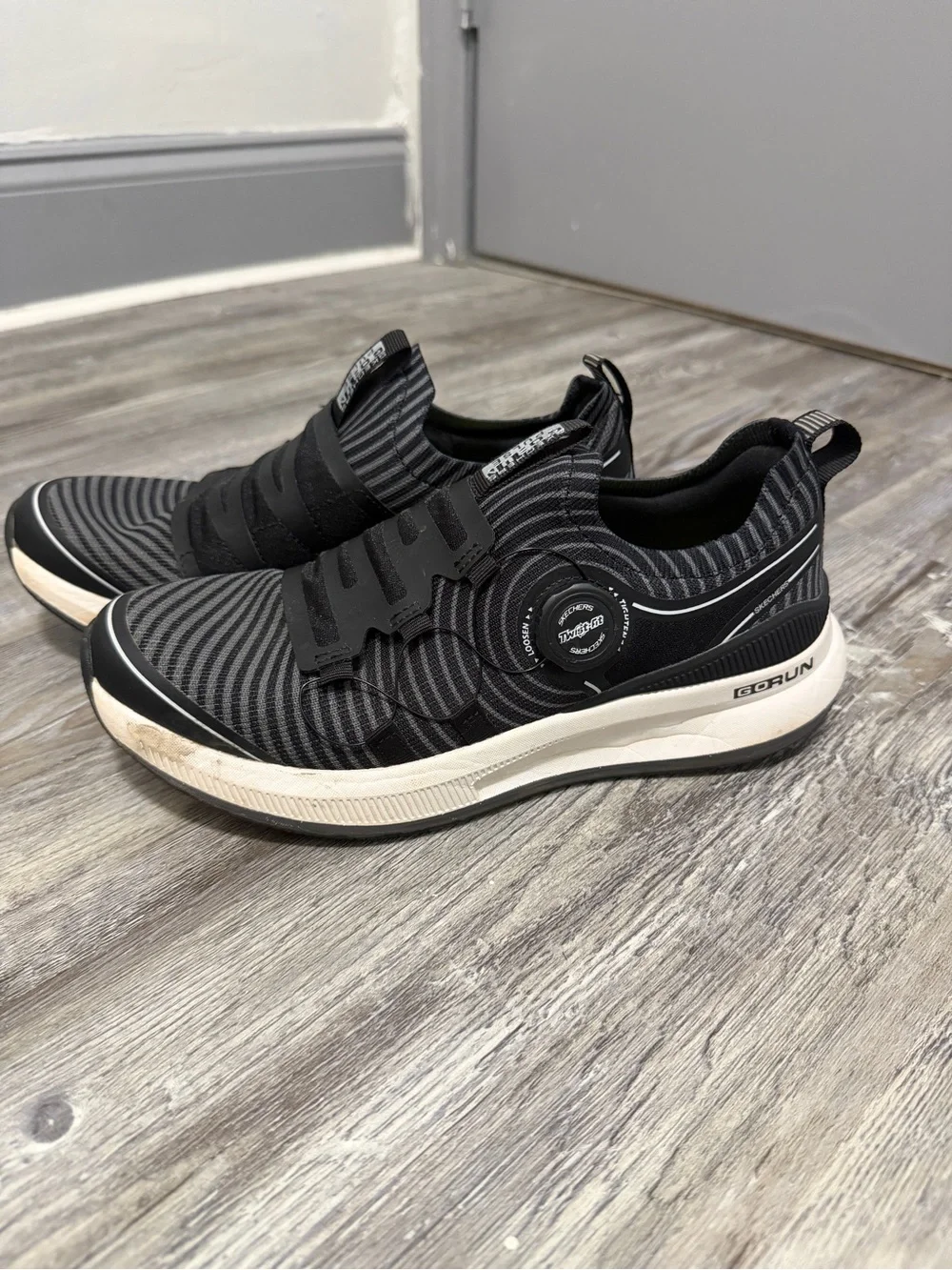 Skechers Black and White Slip-On Knit Sneakers